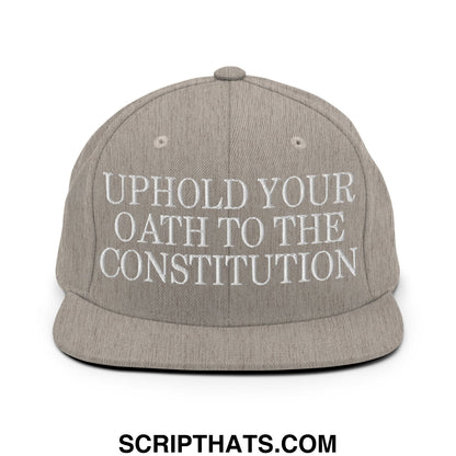 Gray snapback hat with white embroidered uphold your oath to the constitution text on a flat bill brim