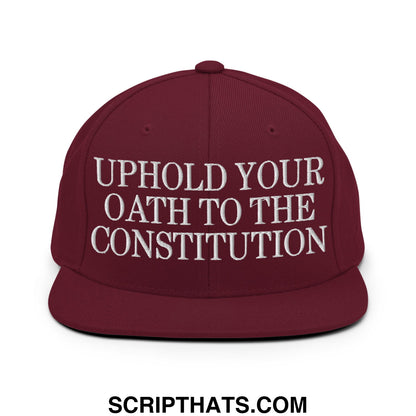 Maroon flat bill snapback hat with white embroidered uphold your oath to the constitution text on front