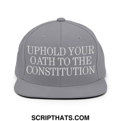 Gray snapback hat with white embroidered uphold your oath to the constitution text and flat bill brim design