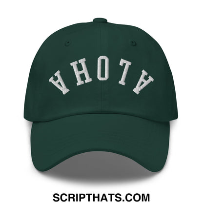 Dark green unstructured dad hat with white embroidered ahoha lettering in an arched design upside down aloha style