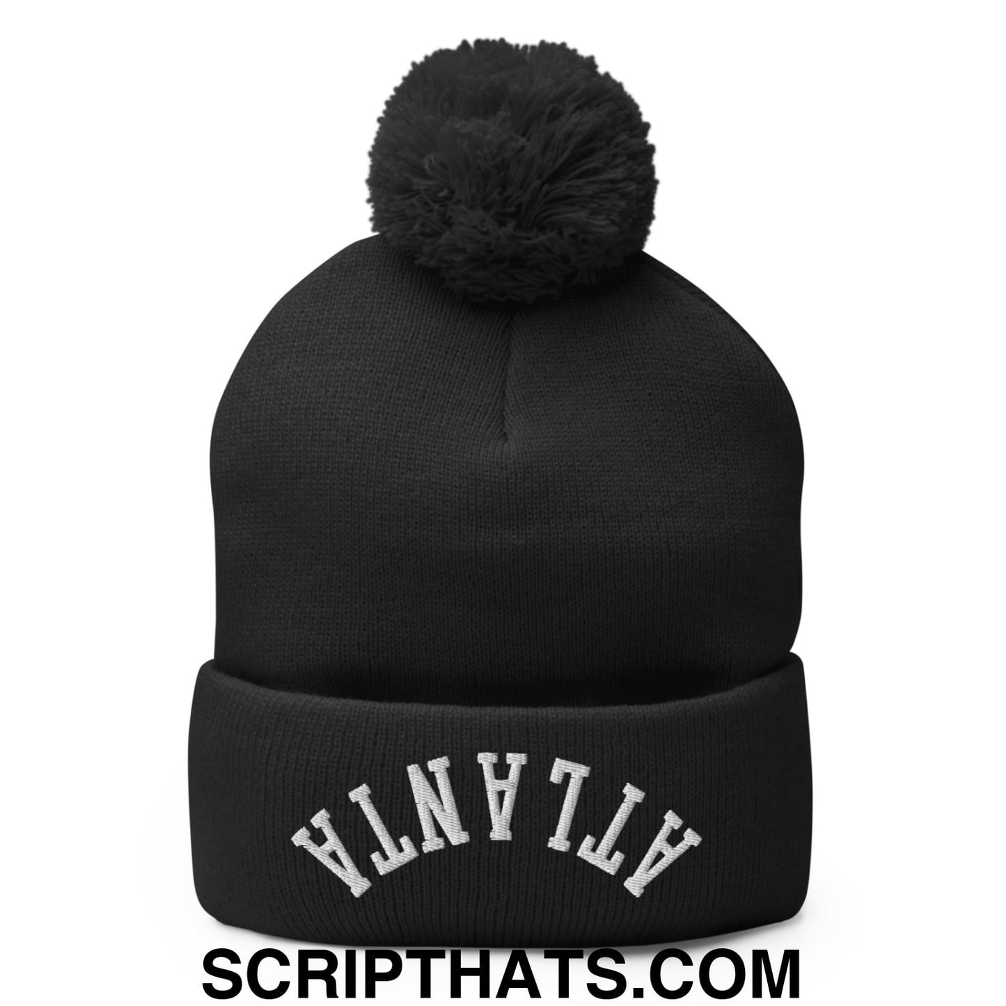 Black knit beanie with white embroidered atlanta on the cuff and a fluffy black pom pom on top
