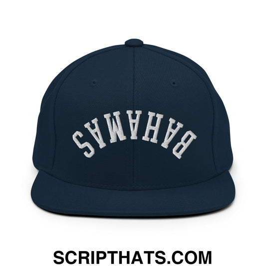 Navy blue snapback hat with white embroidered Bahamas lettering and flat bill brim in an arched design