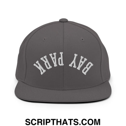 Gray snapback cap with white embroidered bay park lettering in an arched design and flat bill brim