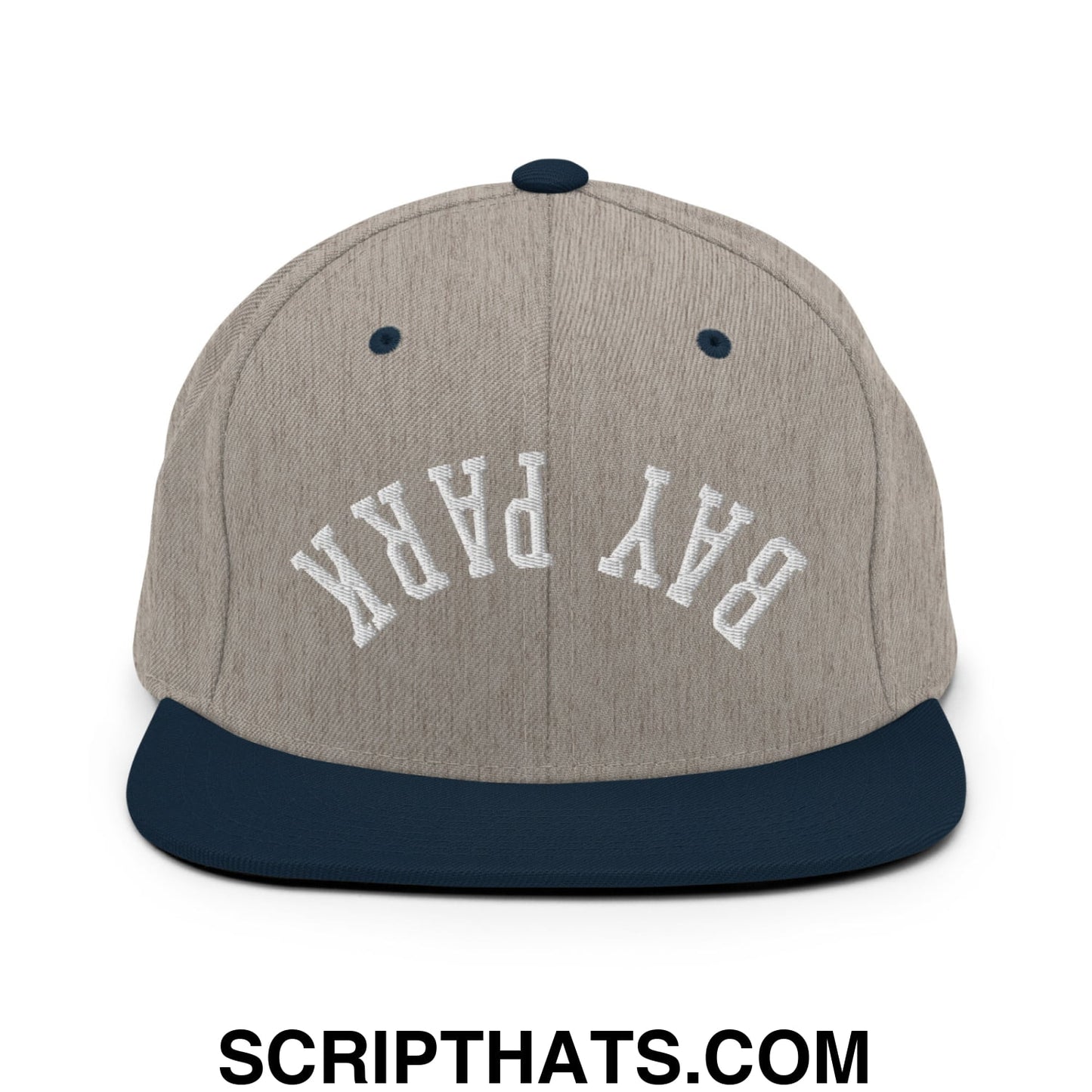 A gray and navy blue snapback hat with bay park embroidered in white on the front and a flat bill brim