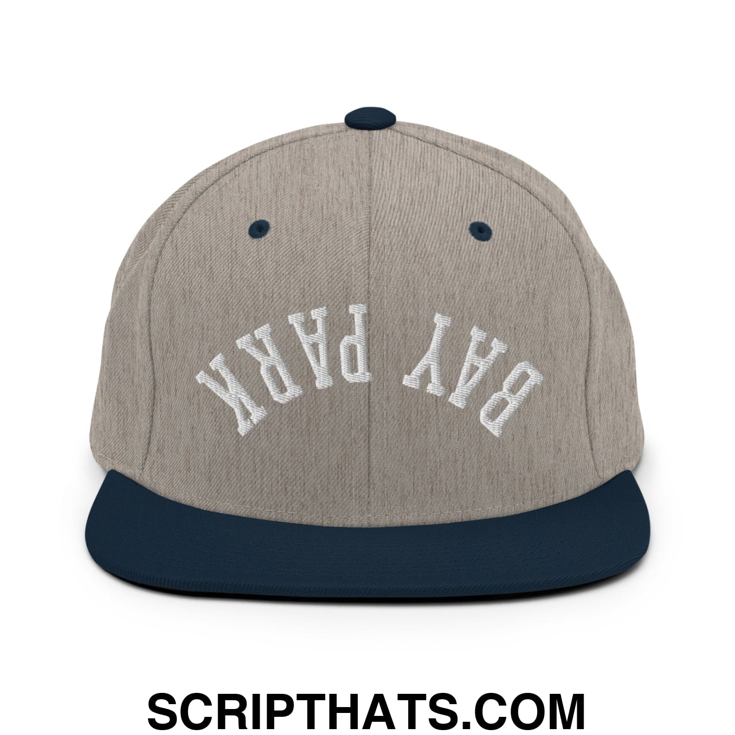 A gray and navy blue snapback hat with bay park embroidered in white on the front and a flat bill brim