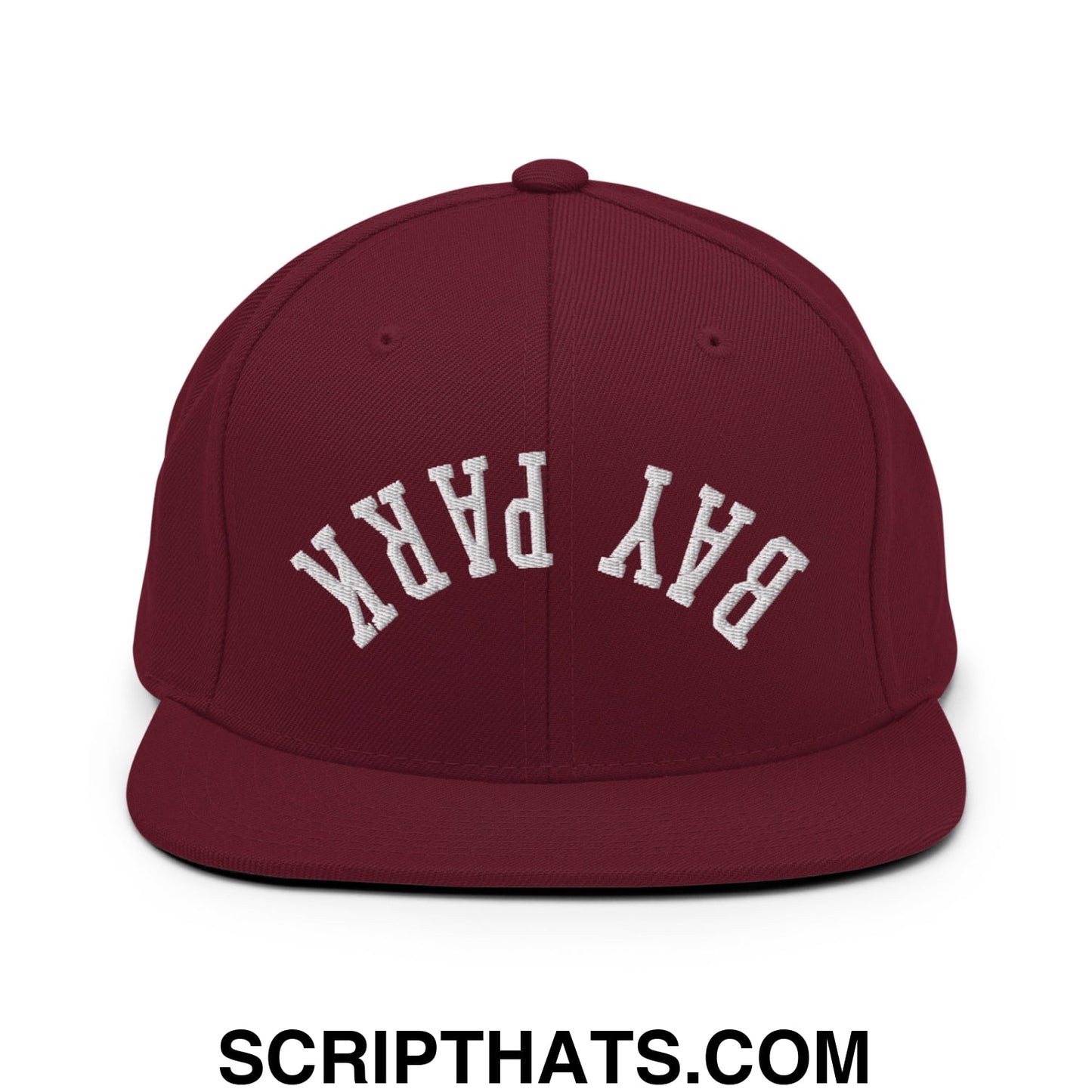 Maroon flat bill snapback hat with white embroidered bay park lettering in a classic arched design