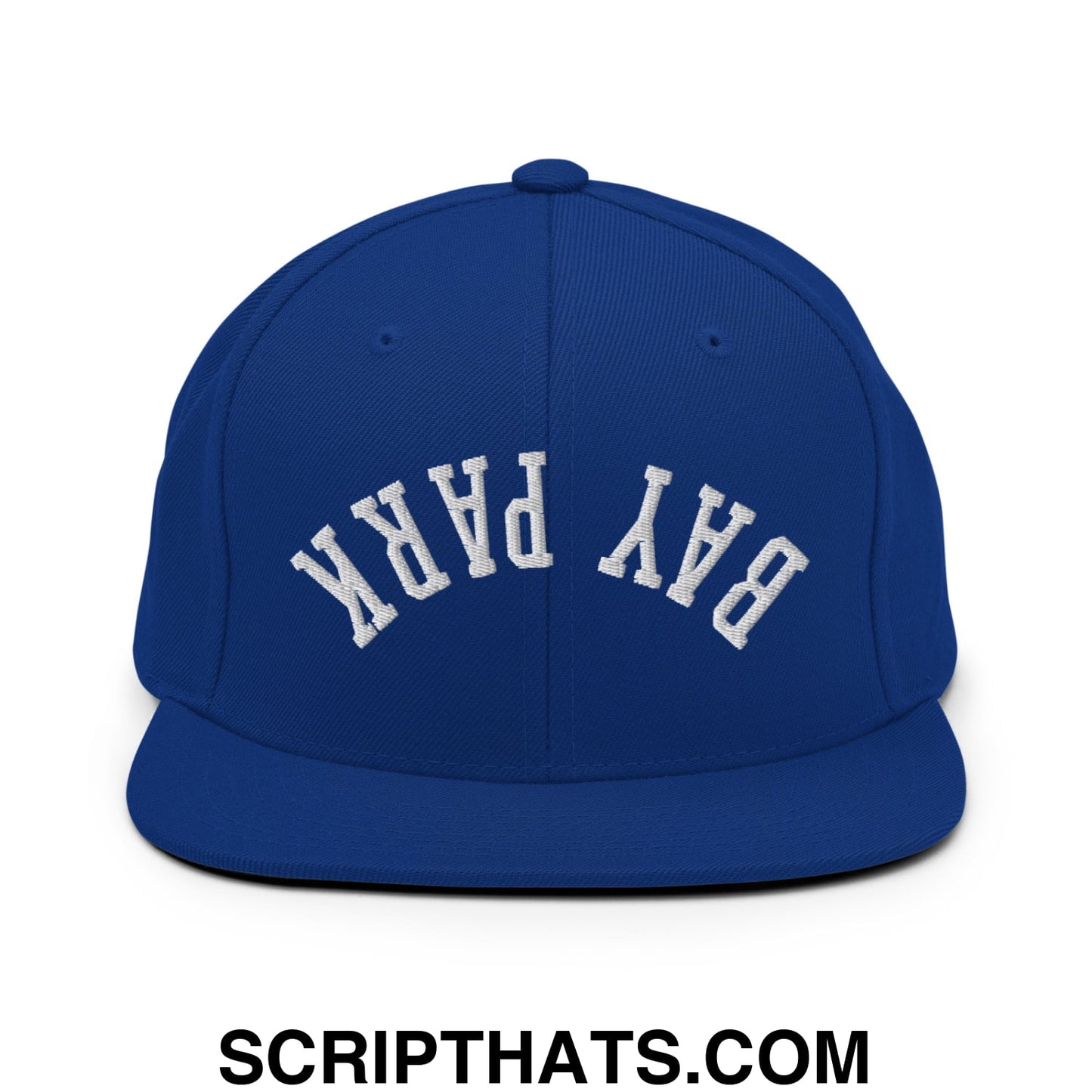 Royal blue snapback hat with white embroidered bay park lettering and flat bill brim in a classic arched design
