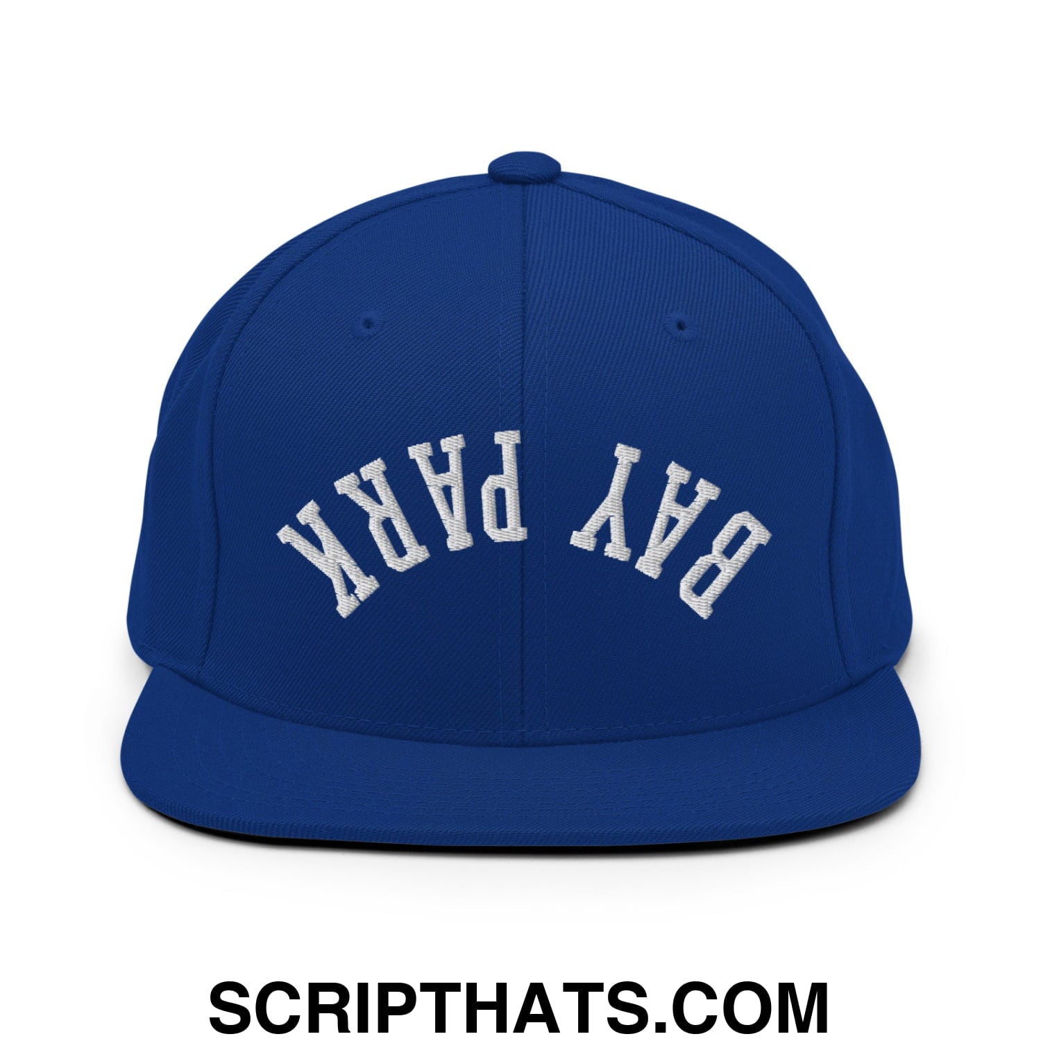 Royal blue snapback hat with white embroidered bay park lettering and flat bill brim in a classic arched design