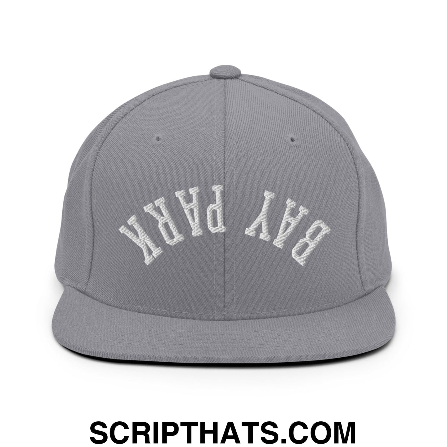 Gray snapback hat with white embroidered bay park lettering and flat bill brim in upside down style