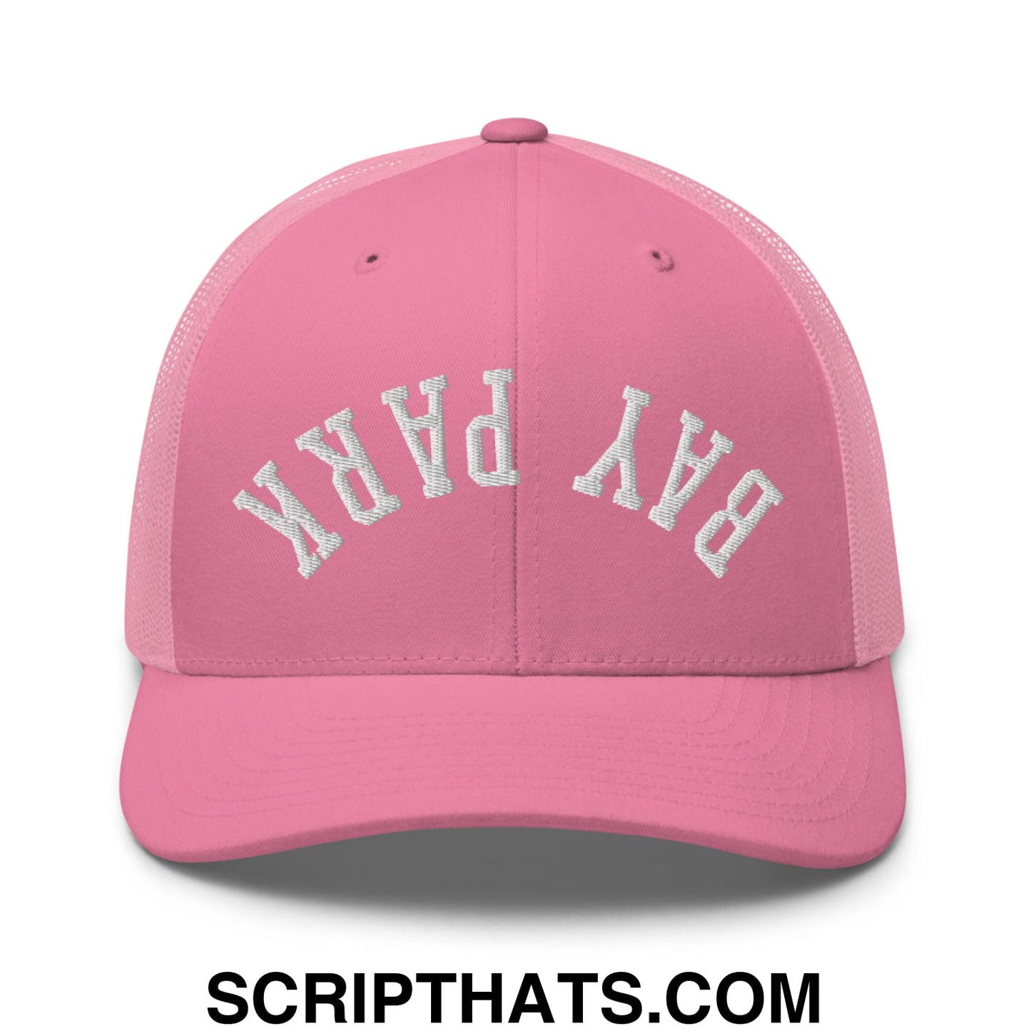 Pink mesh trucker hat with white embroidered bay park lettering featuring upside down design
