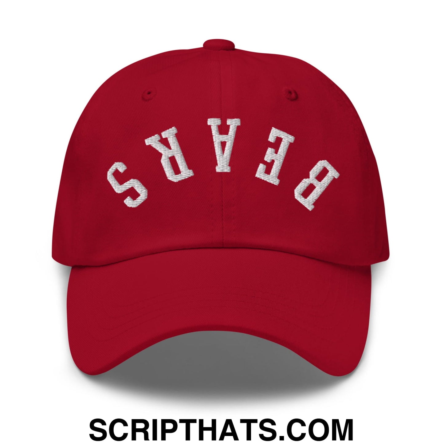 Red unstructured dad hat with white embroidered bears lettering in an arched design upside down style