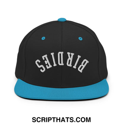 Black snapback hat with teal brim and button featuring white birds embroidered in arched lettering on front