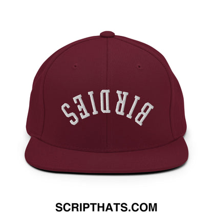 Maroon flat bill snapback hat with white embroidered birdies lettering in an arched design