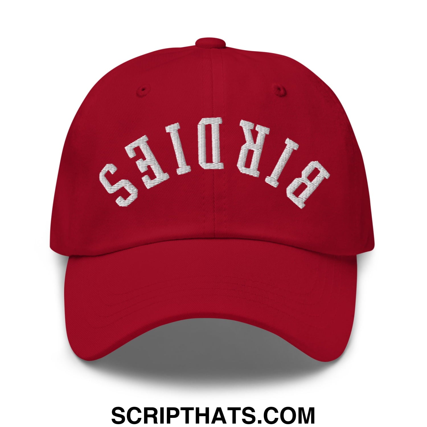 Red unstructured dad hat with white embroidered birds lettering in an arched design titled upside down birdies