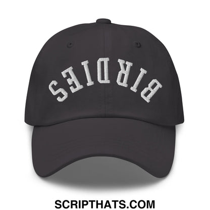 Black unstructured dad hat with white embroidered birds lettering in an arched design titled upside down birdies