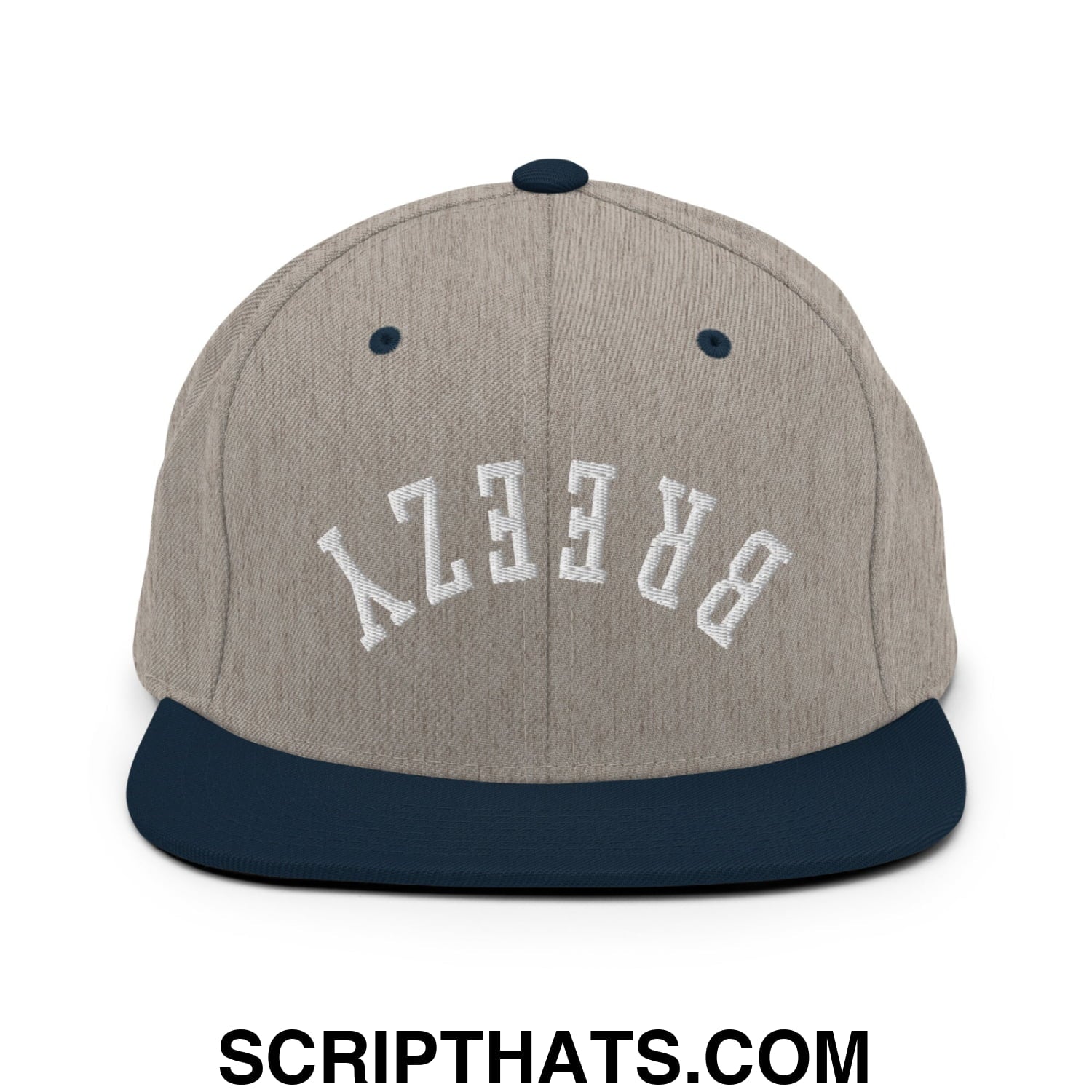 A gray and navy blue snapback hat with white breezy embroidery on the front and a flat bill brim
