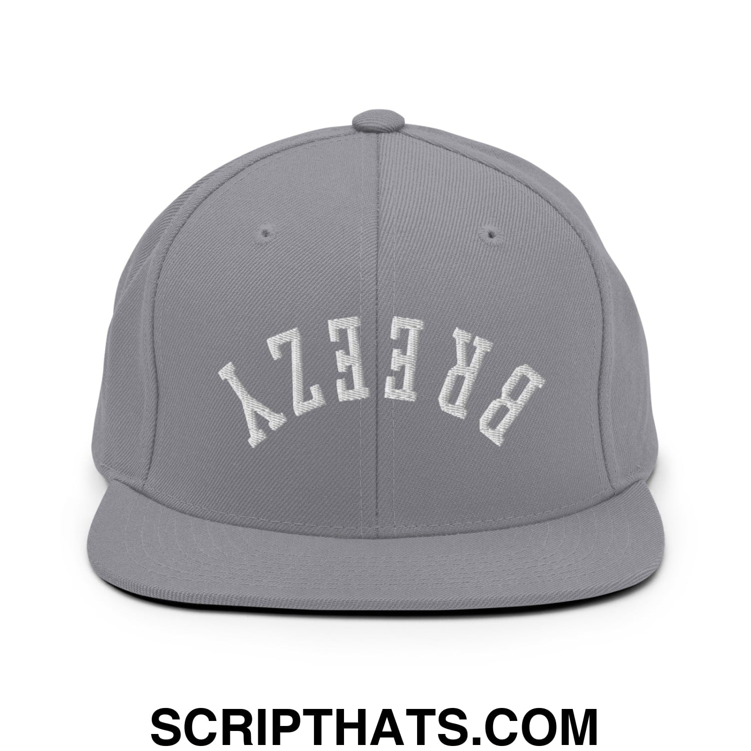 Gray snapback hat with white embroidered breezy lettering and flat bill brim in an upside down design