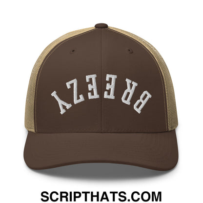 Brown and tan mesh trucker hat with white embroidered breezy lettering in upside down breezy design