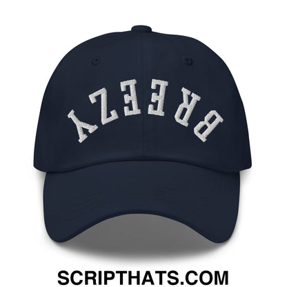 Navy blue unstructured dad hat with white embroidered breezy lettering in a classic arched design