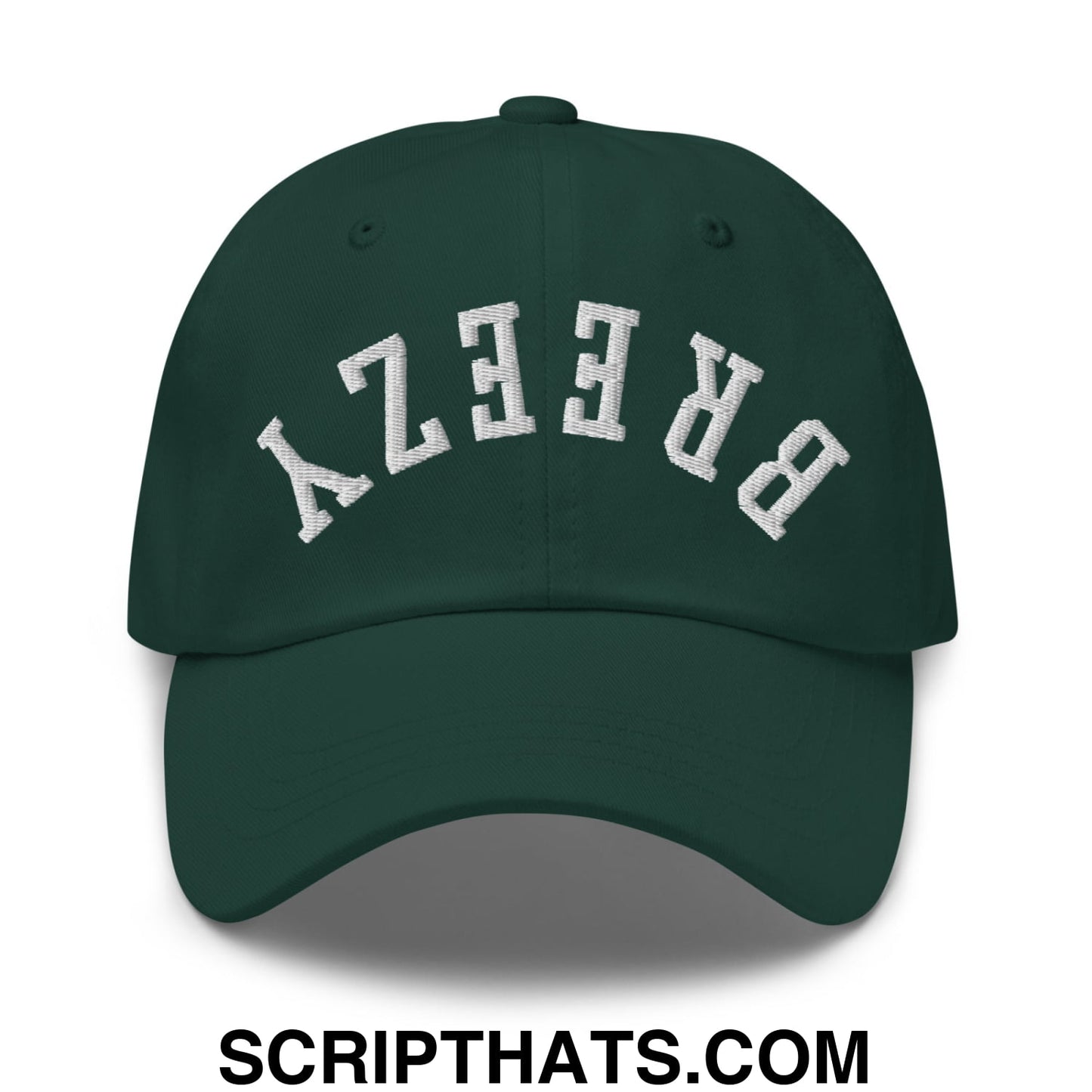 Dark green unstructured dad hat with white embroidered breezy lettering in an arched design