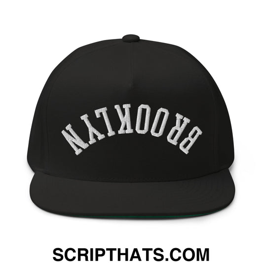 Black snapback cap with white embroidered brooklyn lettering in a classic arched design flat bill brim