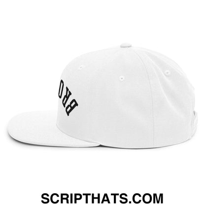 White cotton snapback cap with black embroidered pro lettering on the side from upside down brooklyn collection