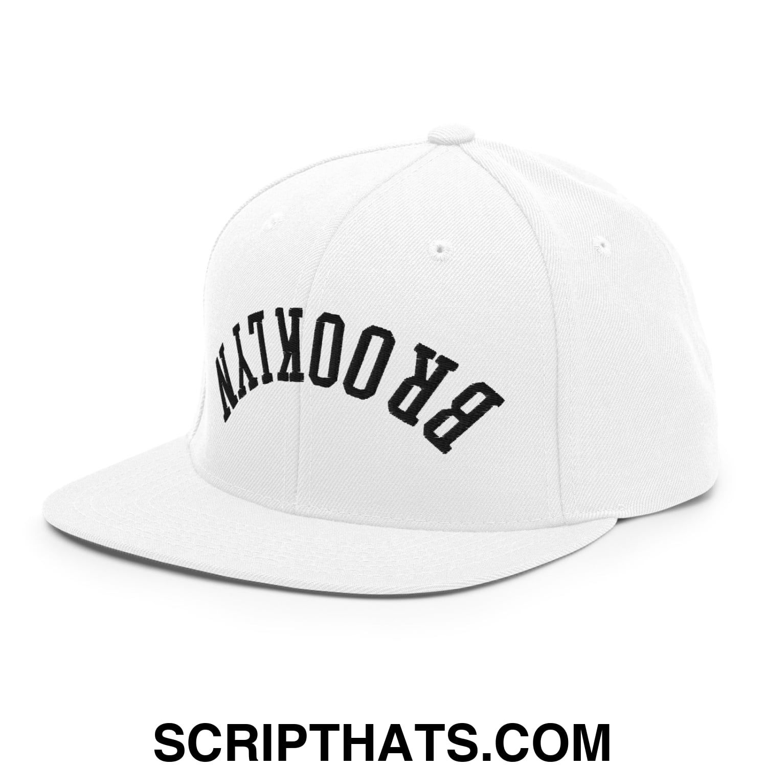 White snapback cap with black arched brooklyn lettering and flat bill brim embroidered design