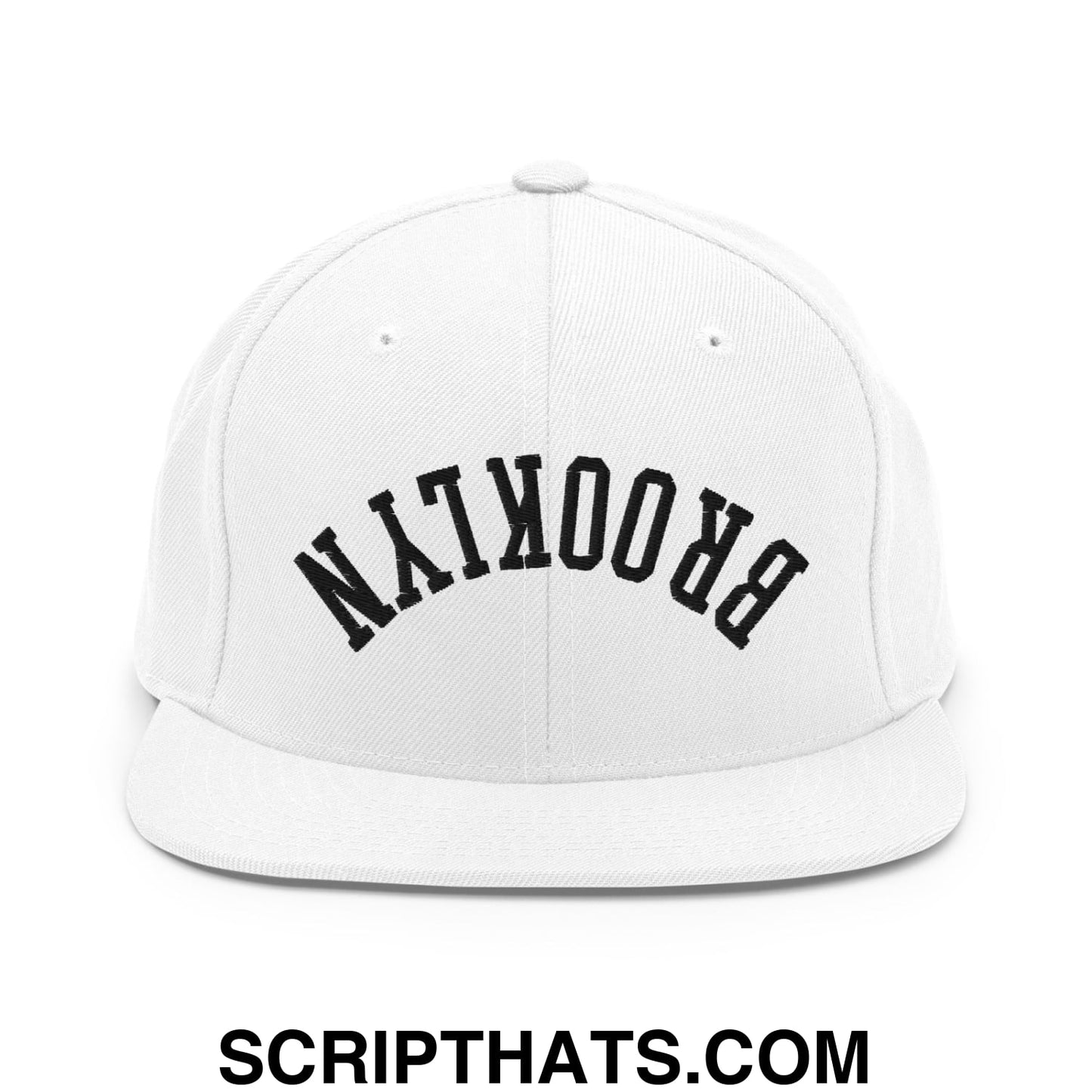 White snapback cap with black arched brooklyn lettering embroidered on flat bill brim for casual wear