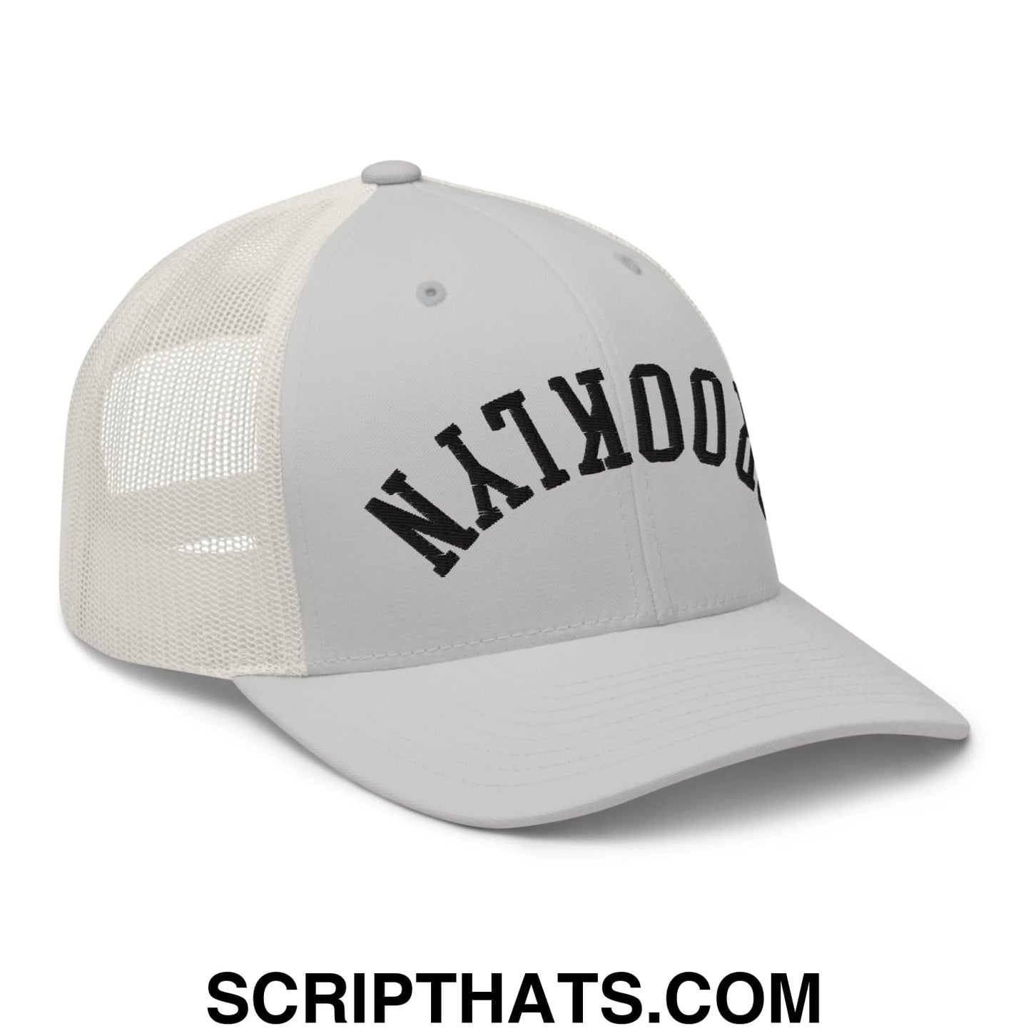 Gray mesh trucker hat with black arched brooklyn lettering embroidered on the front panel