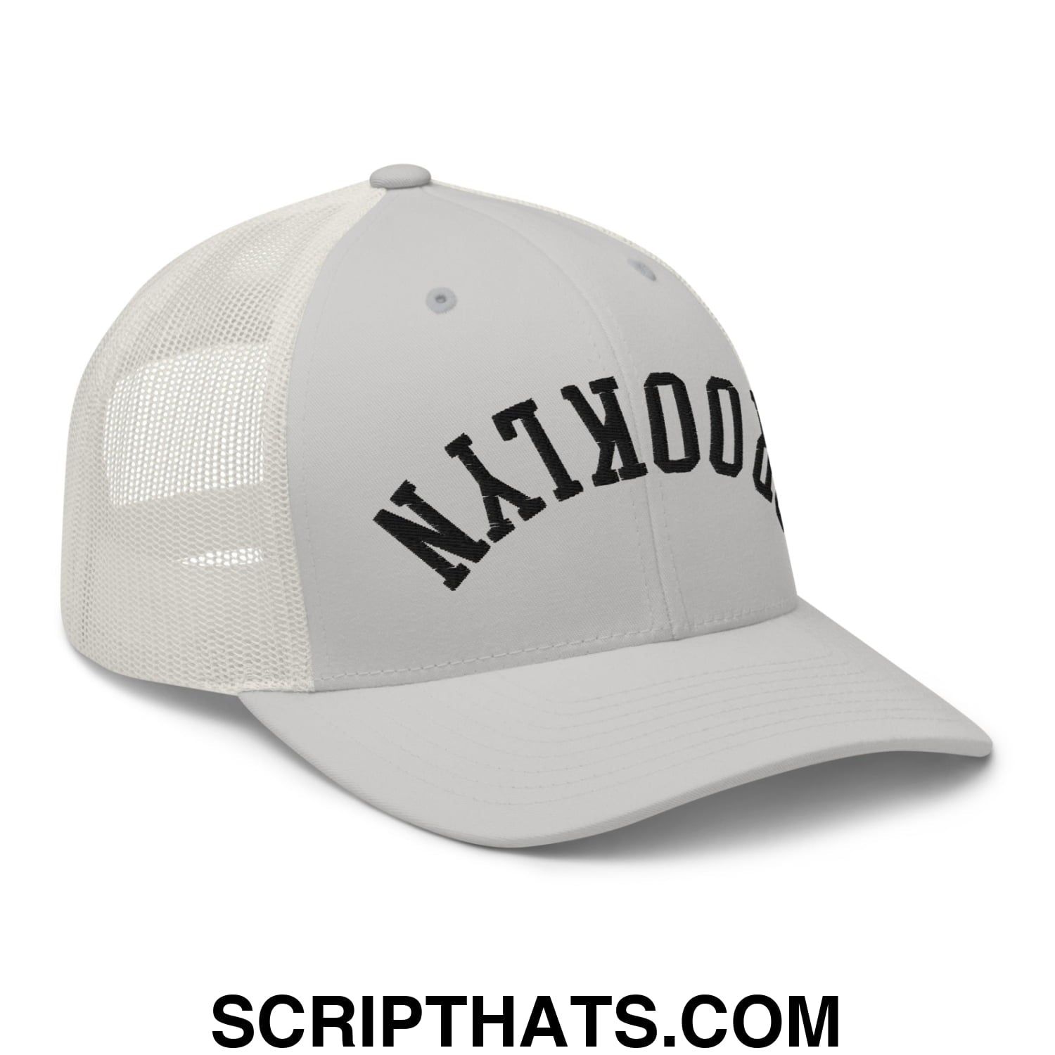 Gray mesh trucker hat with black arched brooklyn lettering embroidered on the front panel