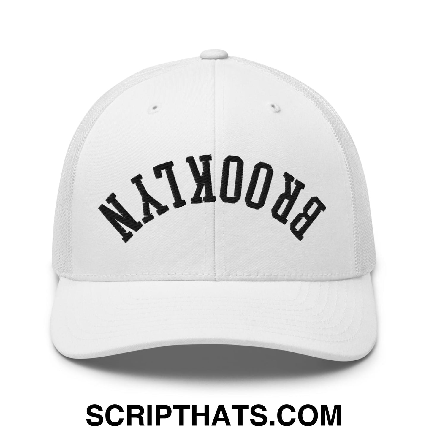 White mesh trucker hat with black arched brooklyn embroidery featuring upside down design