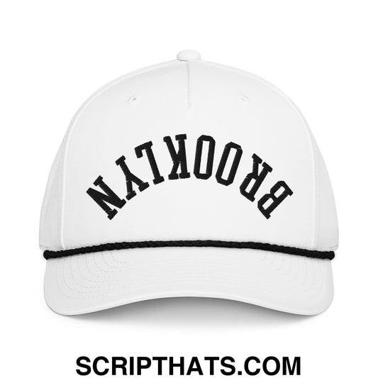 White baseball cap with black arched brooklyn embroidery and matching black stitched brim upside down brooklyn rope hat