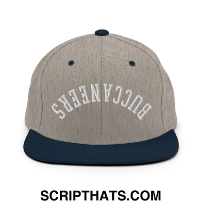 Gray and navy blue snapback cap with white buccaneers embroidered in arched lettering and a flat bill brim