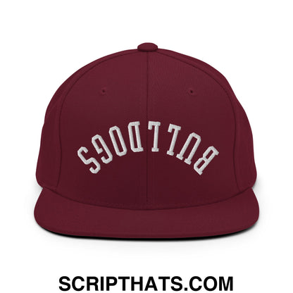 Maroon snapback cap with white embroidered upside down bulldogs arch design and flat bill brim