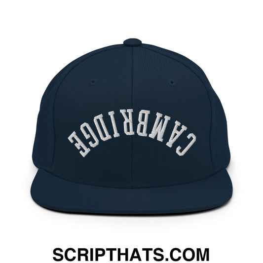 Navy blue snapback hat with white embroidered cambridge lettering and flat bill brim for casual wear