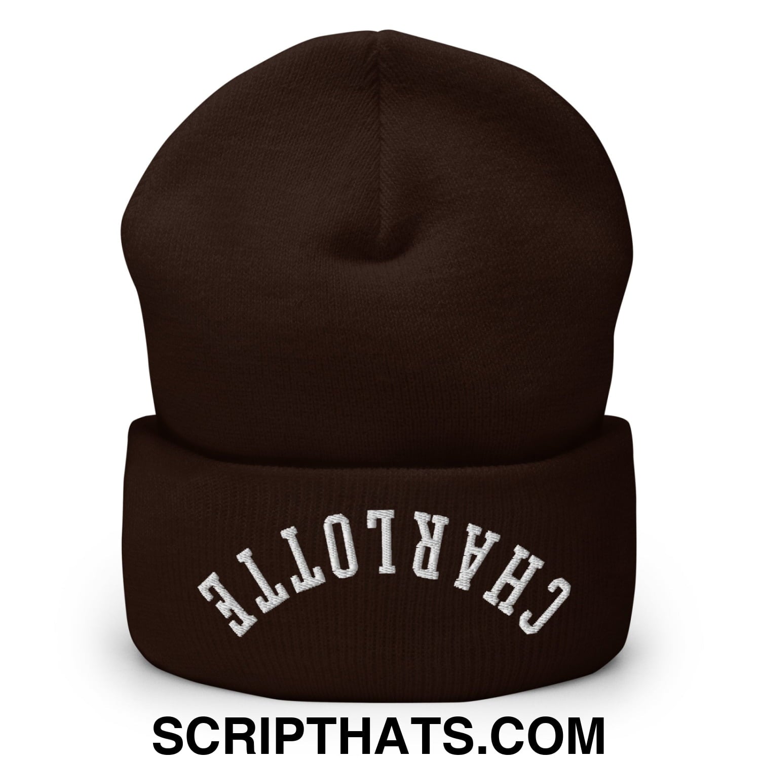 A dark brown knit cuffed beanie with upside down charlotte embroidered in white on the folded cuff