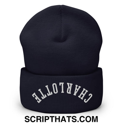 Navy blue knit beanie with white embroidered charlotte on the folded cuff in the upside down charlotte style