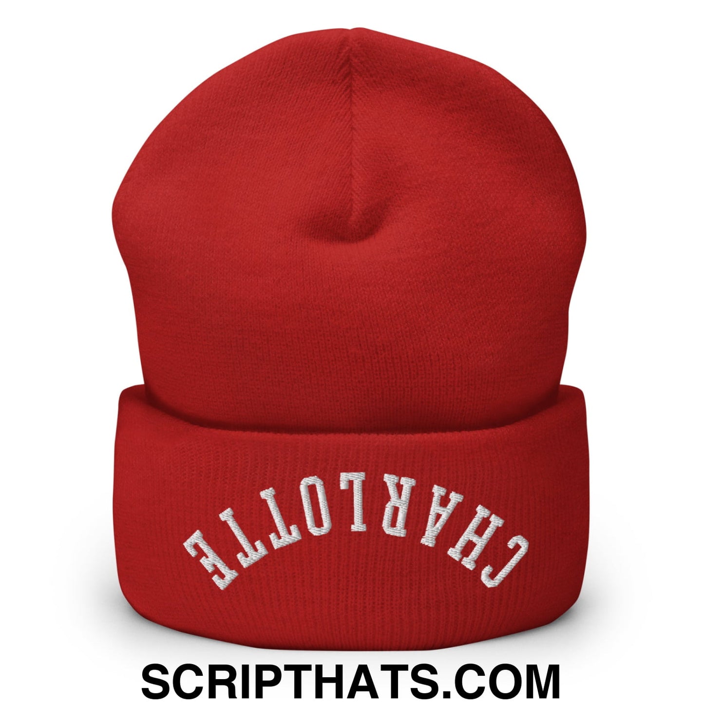 A vibrant red knit cuffed beanie embroidered with charlotte in white arched lettering on the front cuff