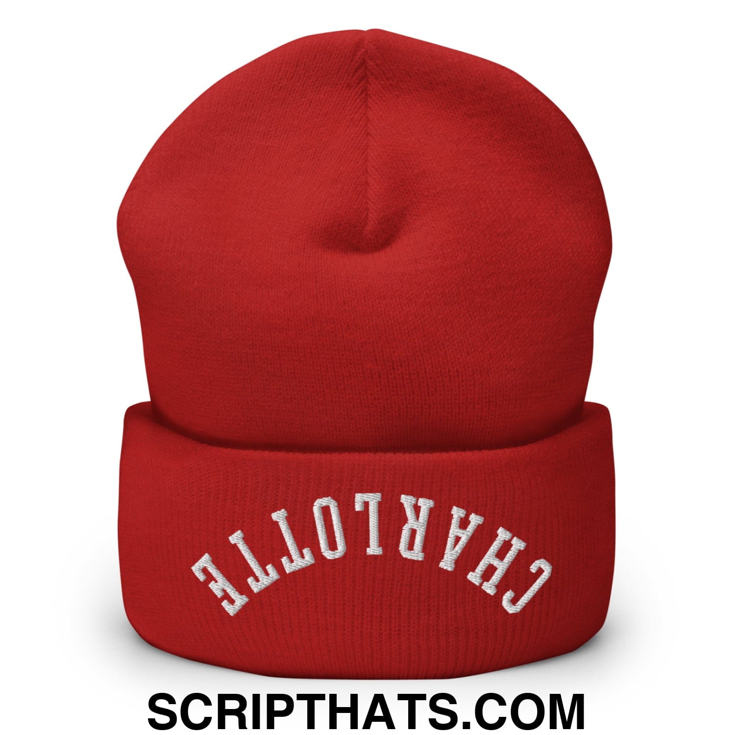 A vibrant red knit cuffed beanie embroidered with charlotte in white arched lettering on the front cuff