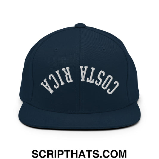 Navy blue snapback cap with white embroidered costa rica arch design and flat bill brim perfect for casual wear