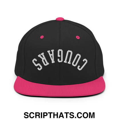 Black snapback hat with vibrant pink brim and button, featuring white embroidered cougars in arched lettering