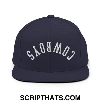 Navy blue snapback hat with white embroidered cowboys lettering and flat bill brim from upside down cowboys