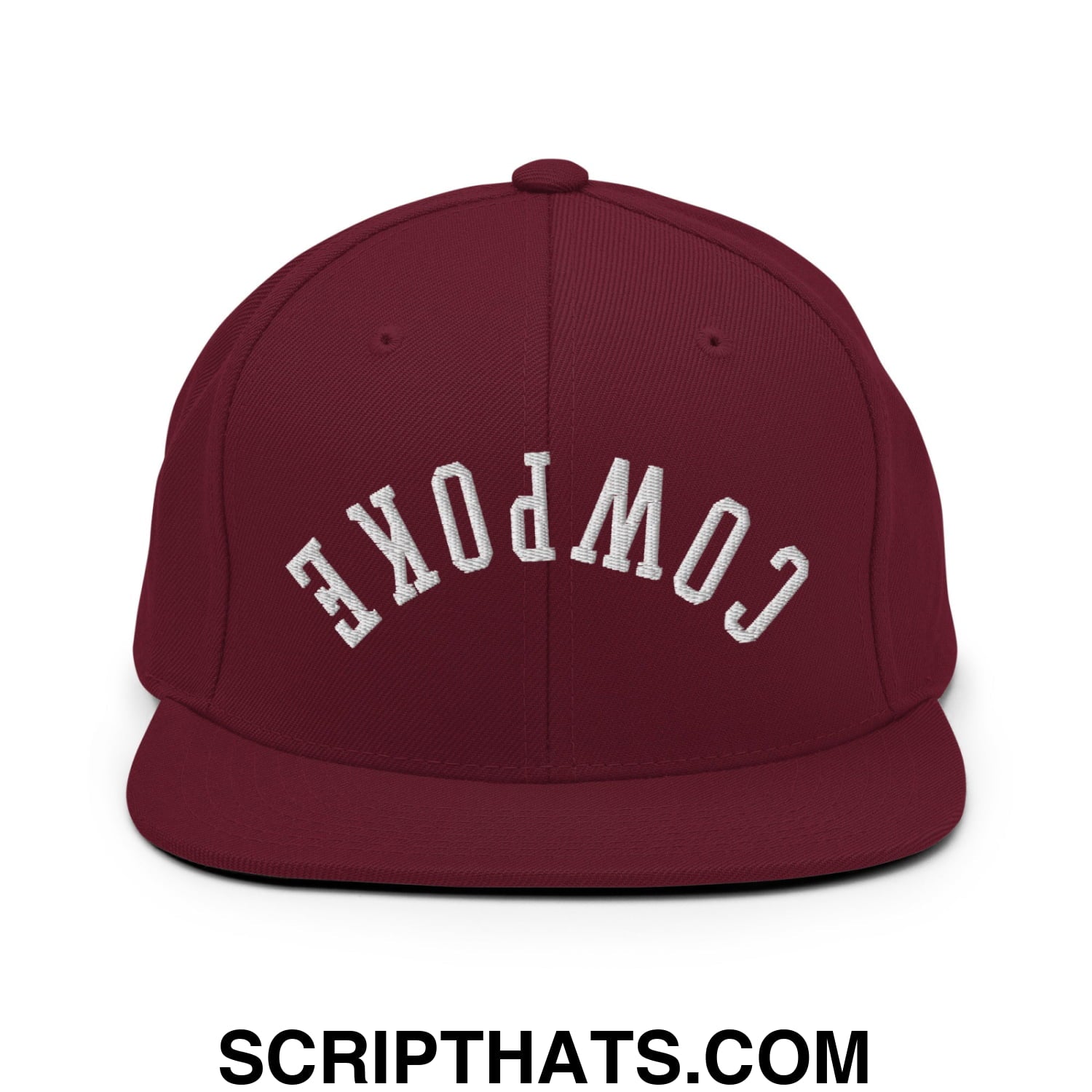 Maroon snapback cap with white embroidered cowpoke lettering and a flat bill brim for casual wear