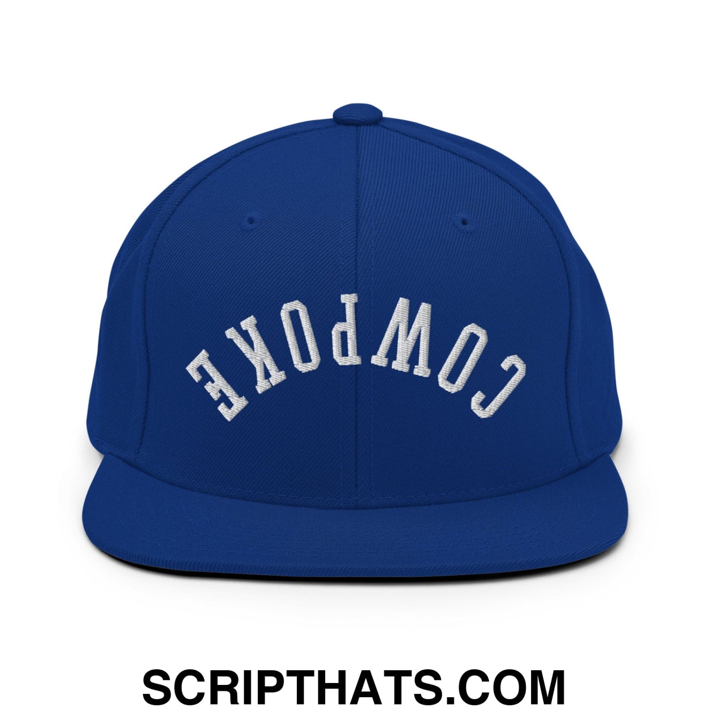 Royal blue snapback hat with white embroidered cowpoke lettering and flat bill brim in an arched design