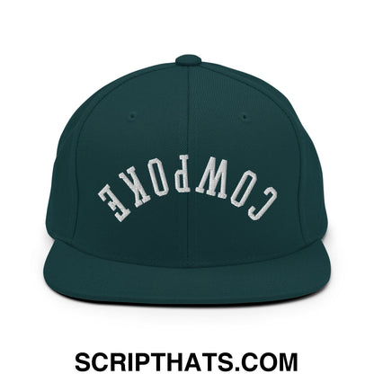 Dark green snapback hat with white embroidered cowpoke lettering in an arched design and flat bill brim