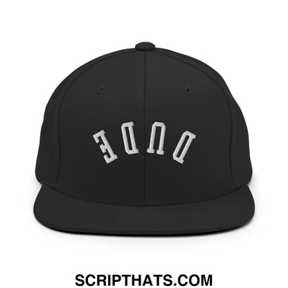 Black snapback cap with white embroidered done lettering and flat bill brim in upside down dude design