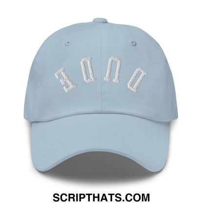 Light blue unstructured dad hat with white embroidered bon lettering in an arched design called upside down dude
