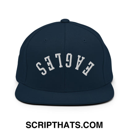 Navy blue snapback hat with white embroidered eagles lettering and a flat bill brim in an arched design