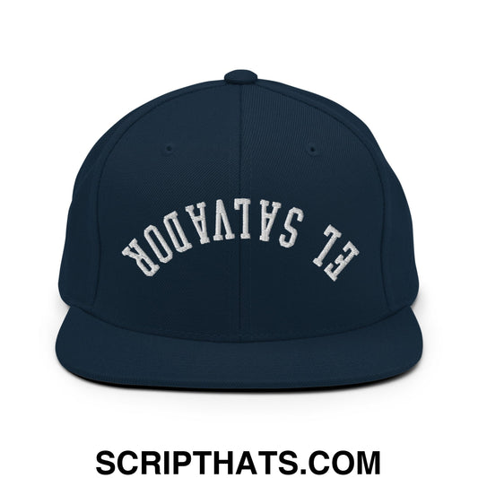 Navy blue snapback hat with white embroidered el Salvador upside down arch flat bill brim design