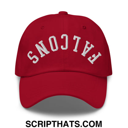 Red unstructured dad hat with white embroidered falcons lettering in an arched design
